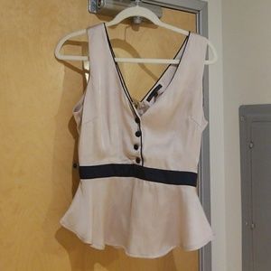 Silky nude and black sleeveless blouse